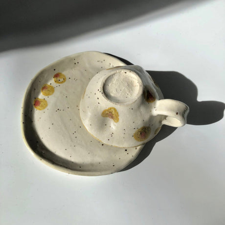 Hiroshi Hirai: Heart Shaped Cup & Saucer Set, Yellow Accents - yunomi-jp.pro