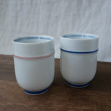 Saikai Ceramics: Red Trim, White Porcelain Yunomi Tea Cup with Blue Accents 150 ml - yunomi-jp.pro