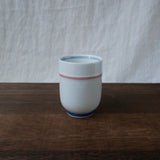 Saikai Ceramics: Red Trim, White Porcelain Yunomi Tea Cup with Blue Accents 150 ml - yunomi-jp.pro